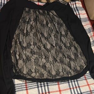 This is a black and tan shirt
